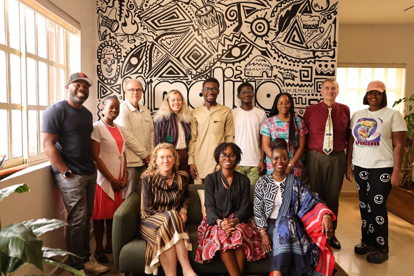 Visitors and team members in the Maliyo studio lobby